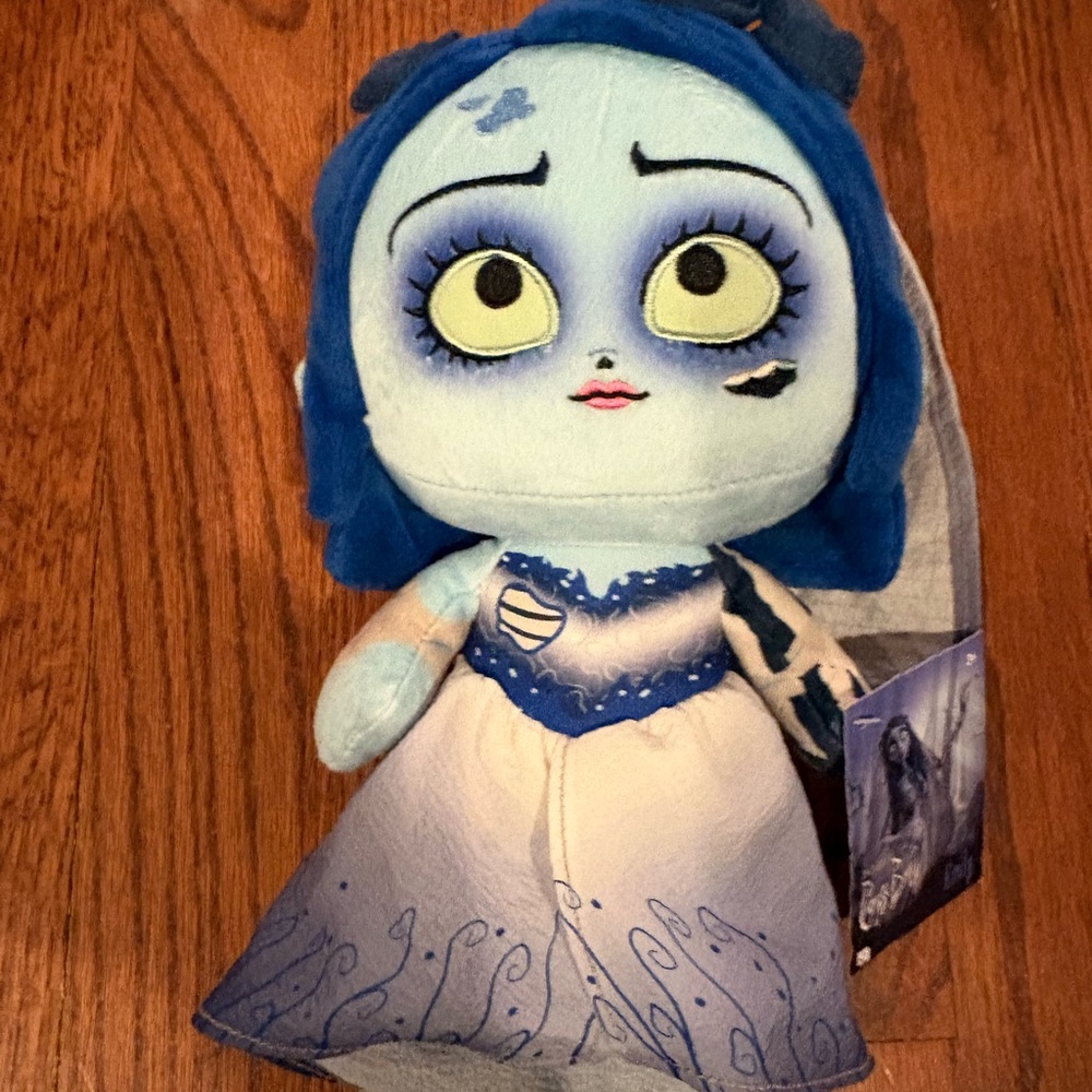 Blue and White Stuffed Doll